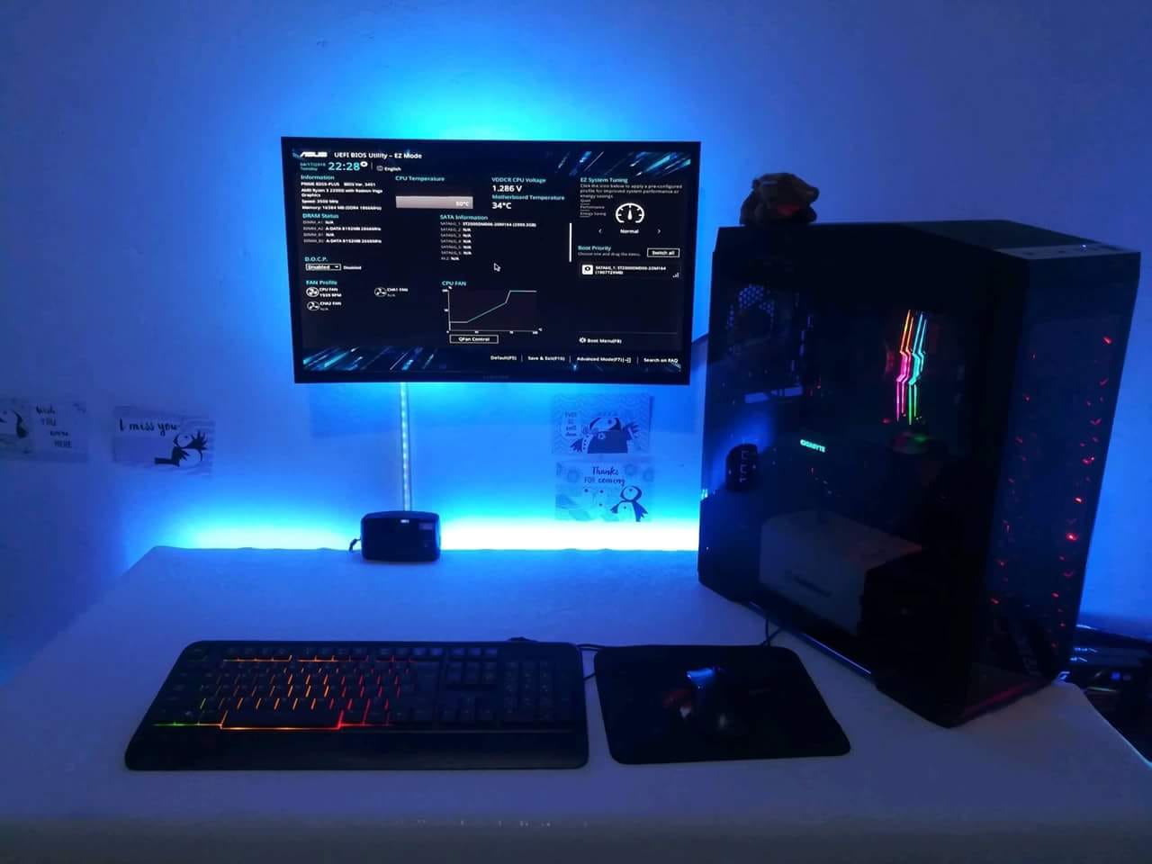 Blue-lit PC build and desk setup by Sanuja Ashan