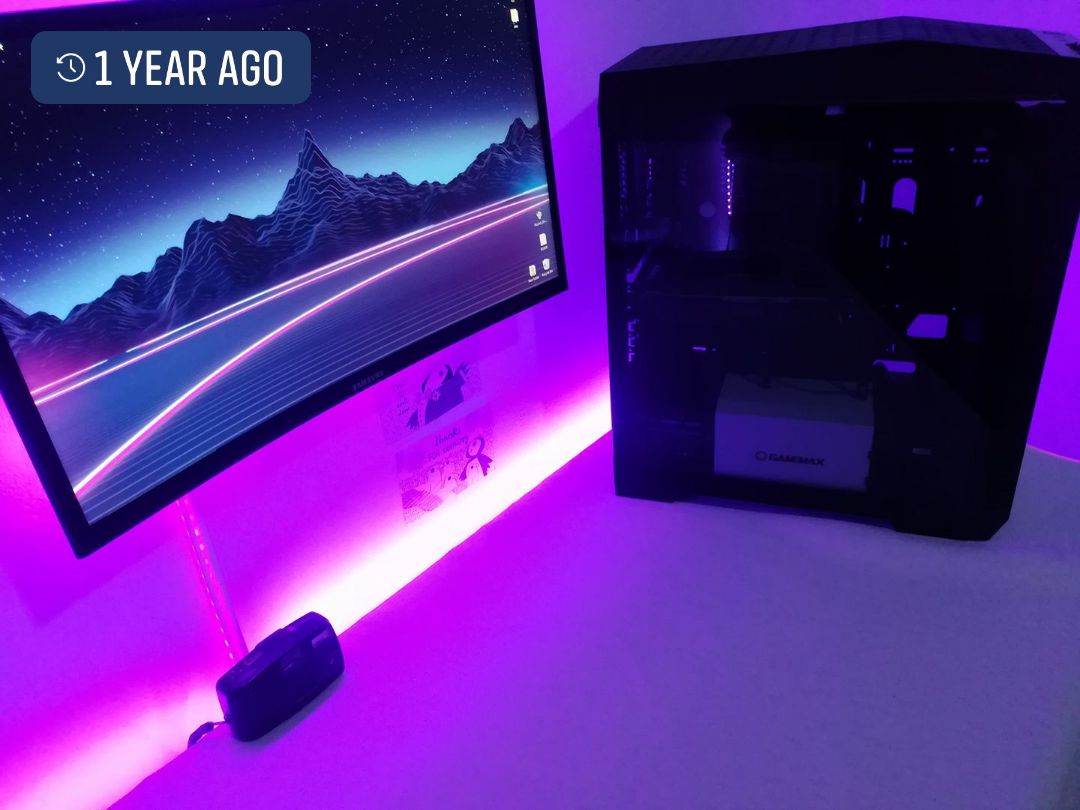 Purple neon PC setup and monitor by Sanuja Ashan